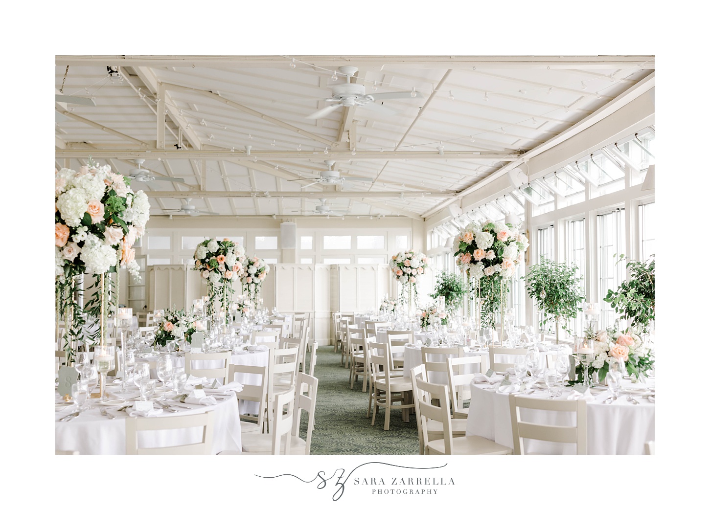 wedding reception at the Dunes Club with tall flower centerpieces 