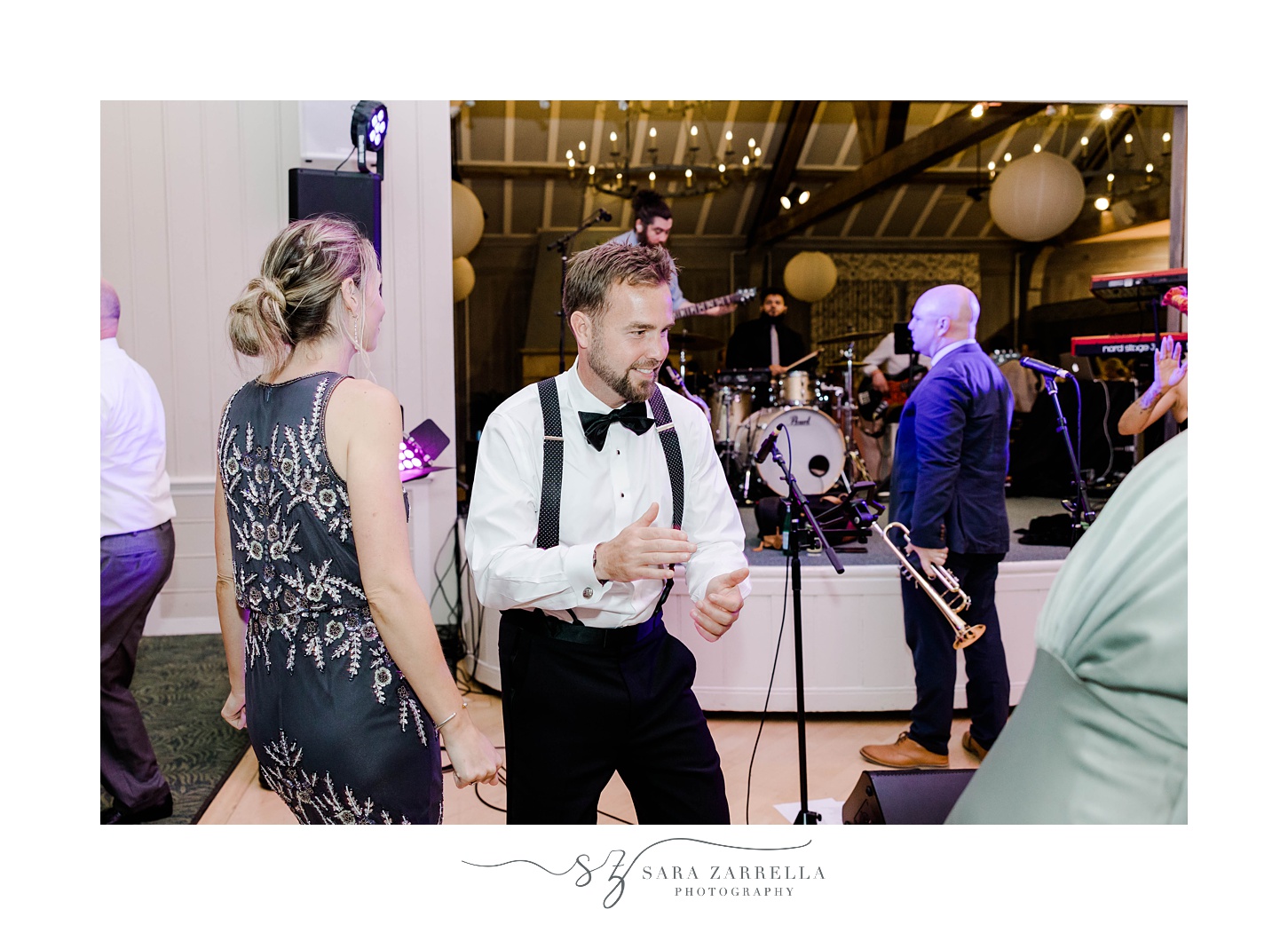 guest dances during during Narragansett, RI wedding reception