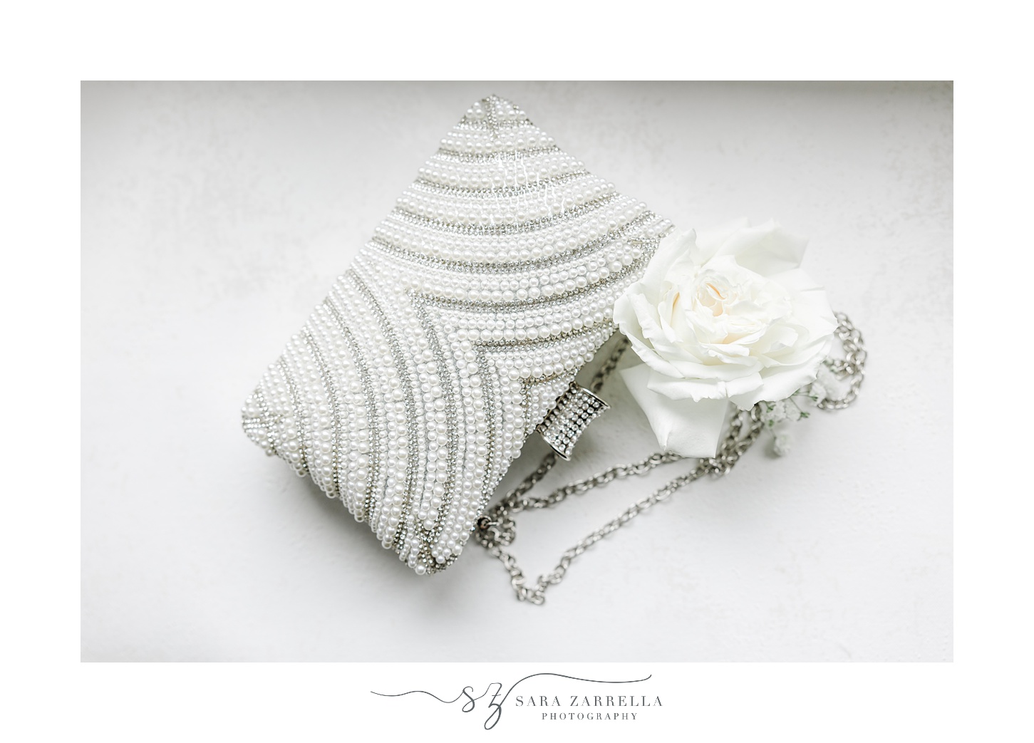 bride's white rose and jeweled cloth for RI wedding day