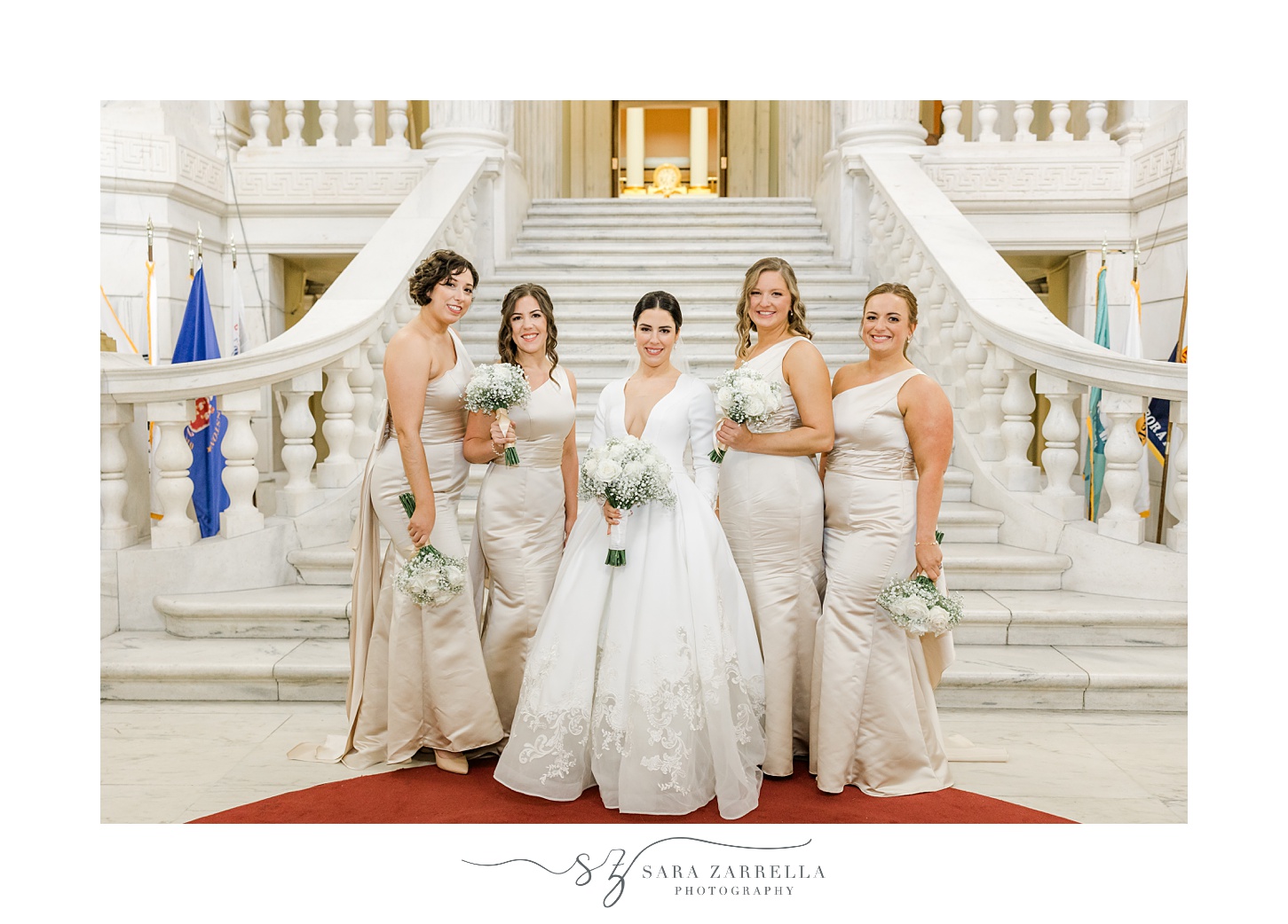 bride poses with bridal party in ivory gowns at the Rhode Island State House in Providence RI