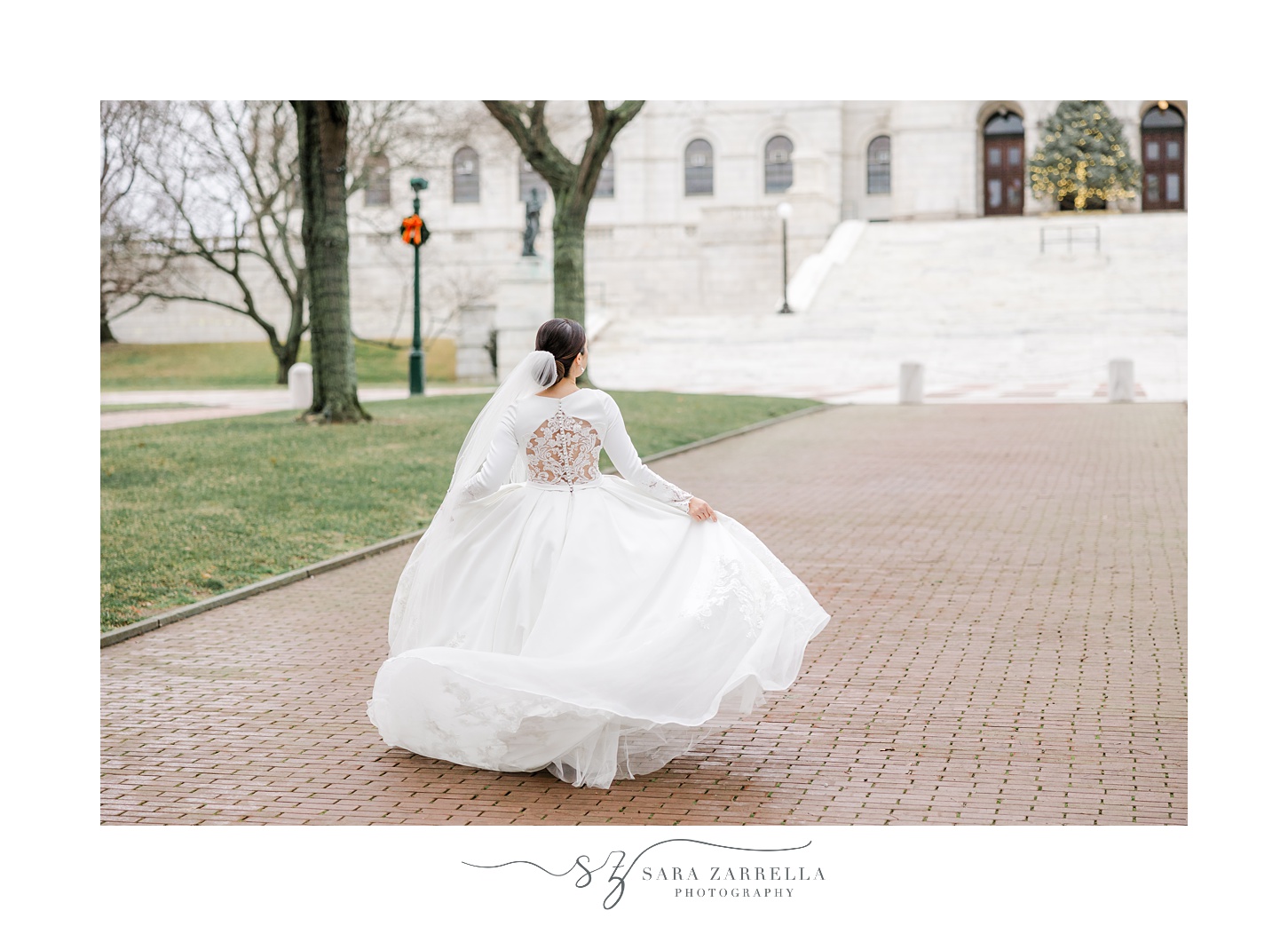 bride twirls in wedding gown outside the Rhode Island State House in Providence RI