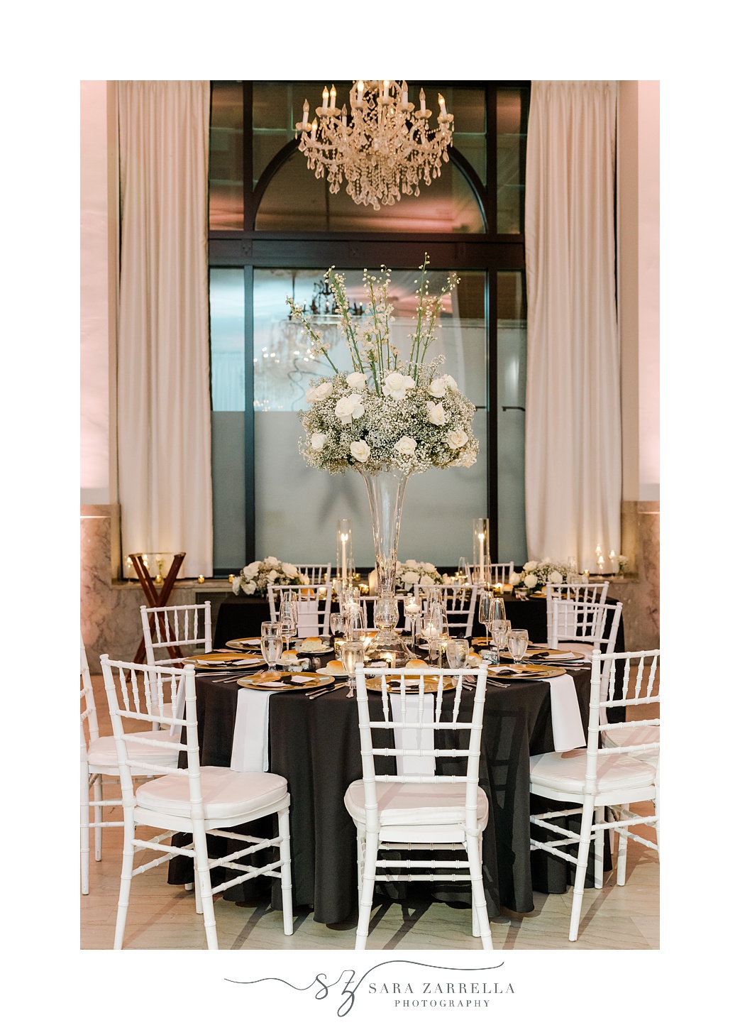 reception table with white flowers for New Year's Eve wedding reception at the Providence G