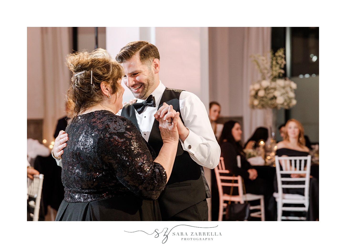 groom and mother dance together during Providence RI wedding reception
