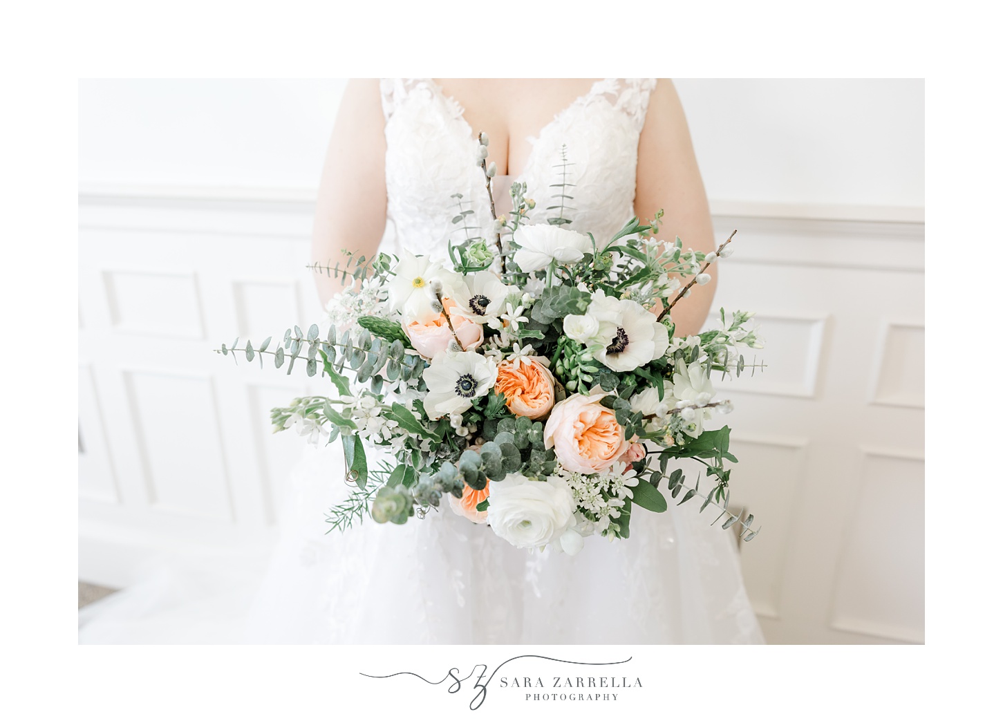 bride's bouquet with white flowers and peach accents