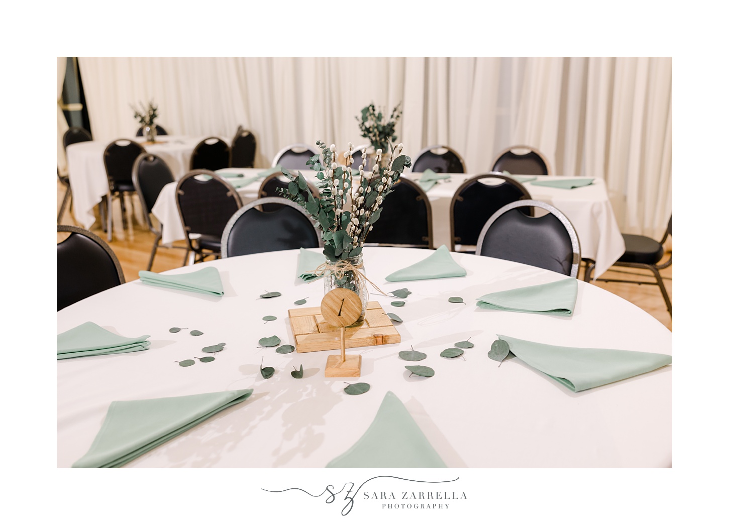 reception tables with green napkins at East Greenwich Town Hall