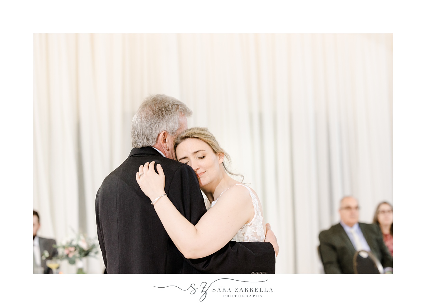 bride dances with dad during wedding reception