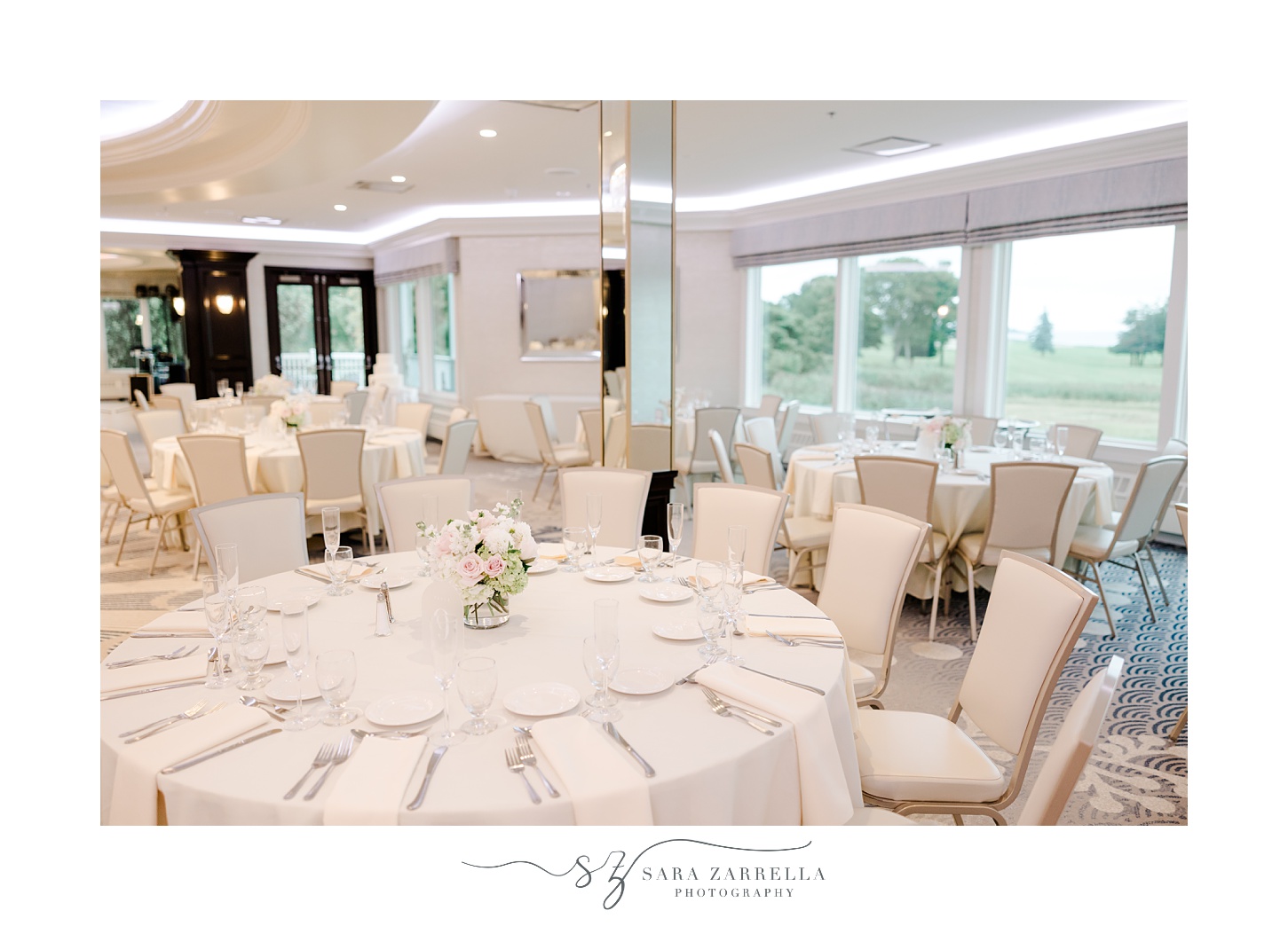 wedding reception with ivory and pink accents at Quidnessett Country Club