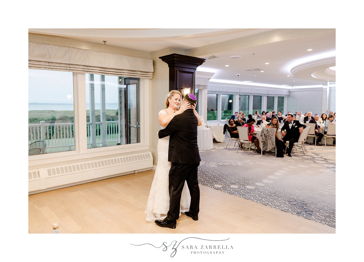couple has first dance in ballroom at Quidnessett Country Club