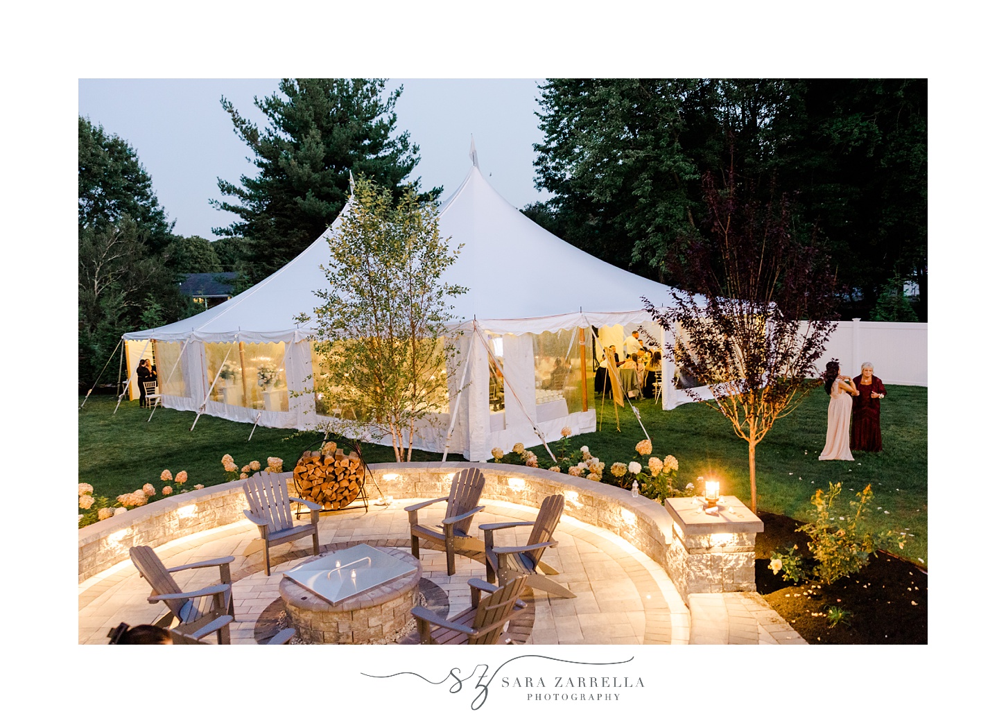 white tent on yard for backyard wedding reception