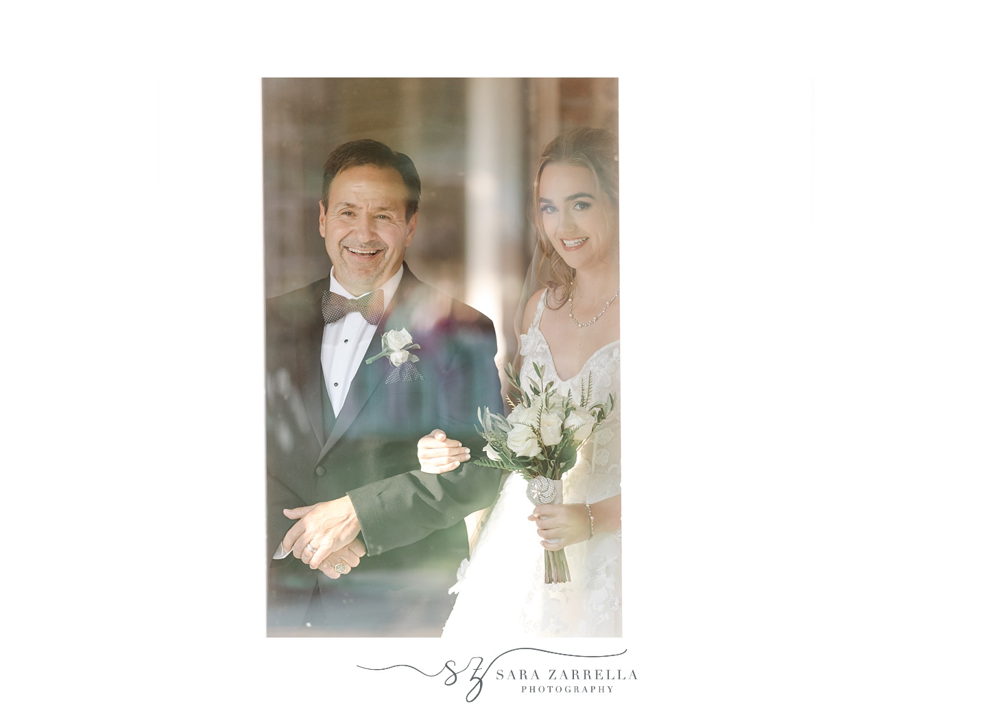 dad smiles with bride on his arm before wedding ceremony entrance