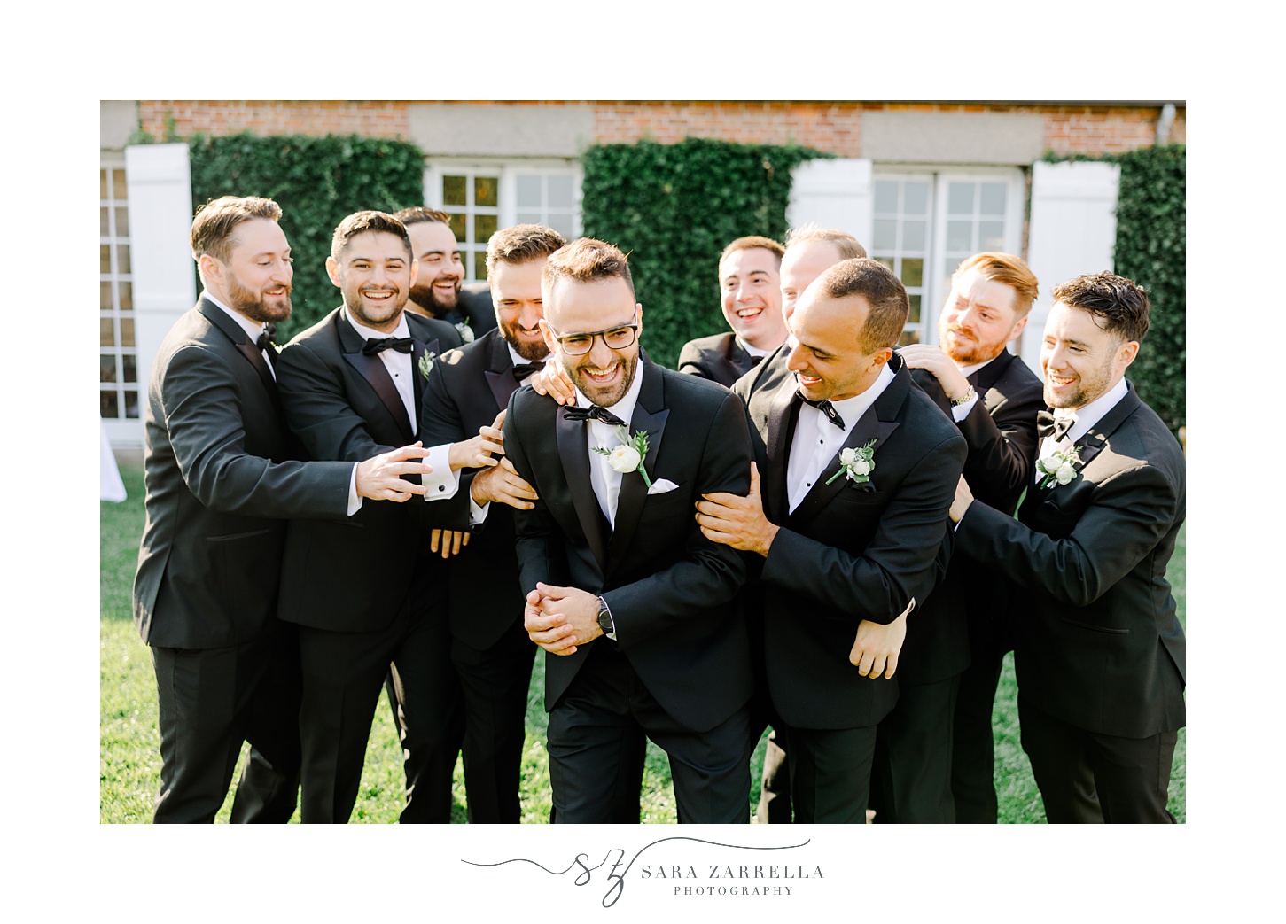 groomsmen run to tackle groom during photos at Shepard's Run