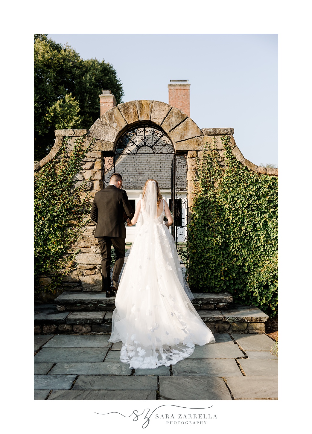 bride and groom walk up steps of garden at Shepard's Run