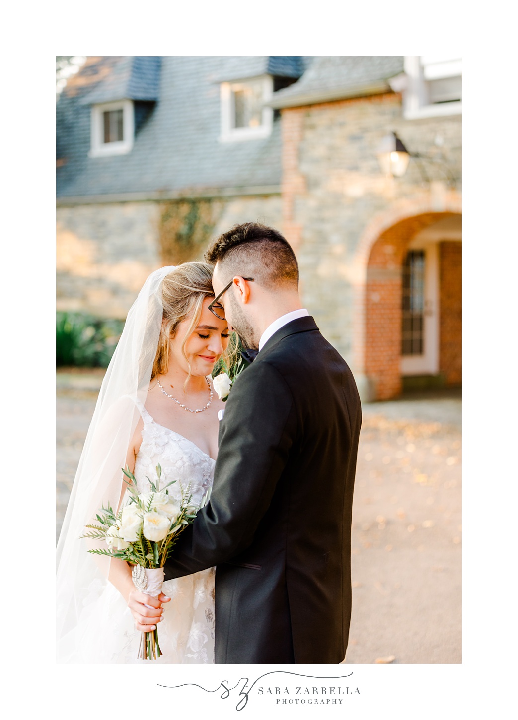 newlyweds hug leaning foreheads together outside Shepard's Run