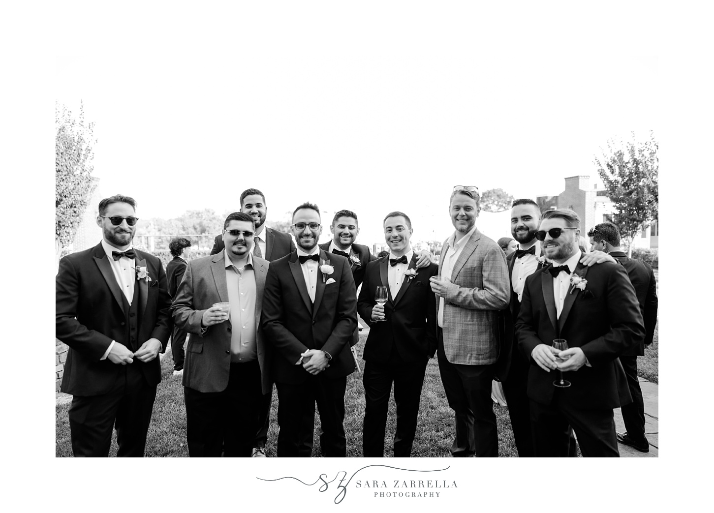 wedding guests mingle on patio of South Kingstown RI wedding reception