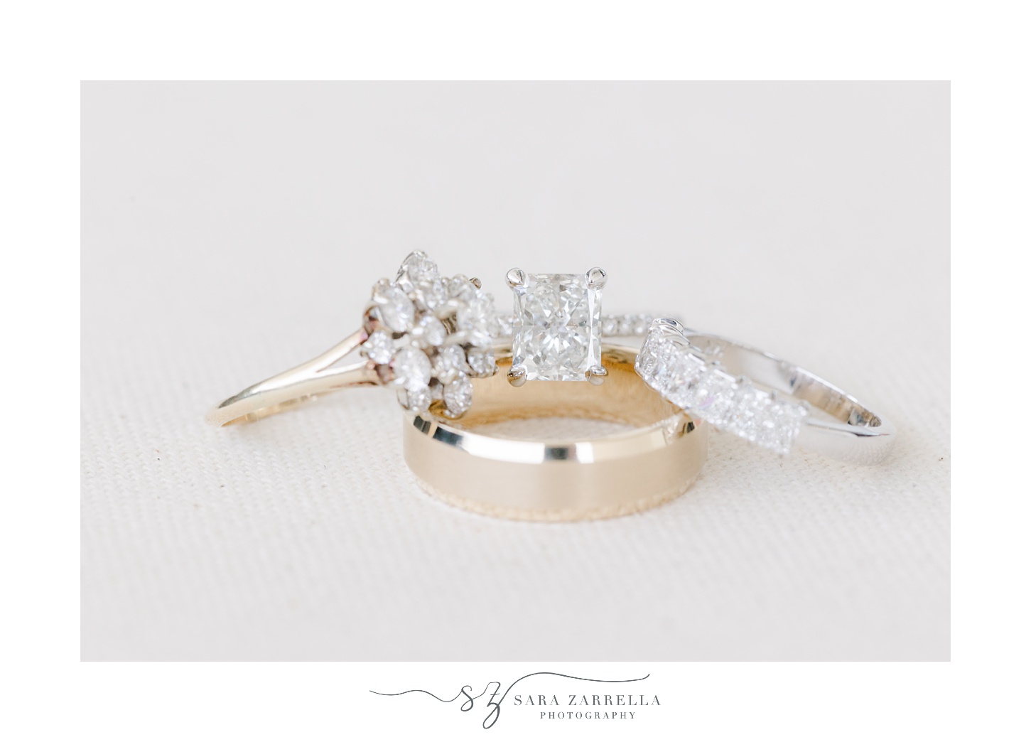 diamond rings rest on wedding bands