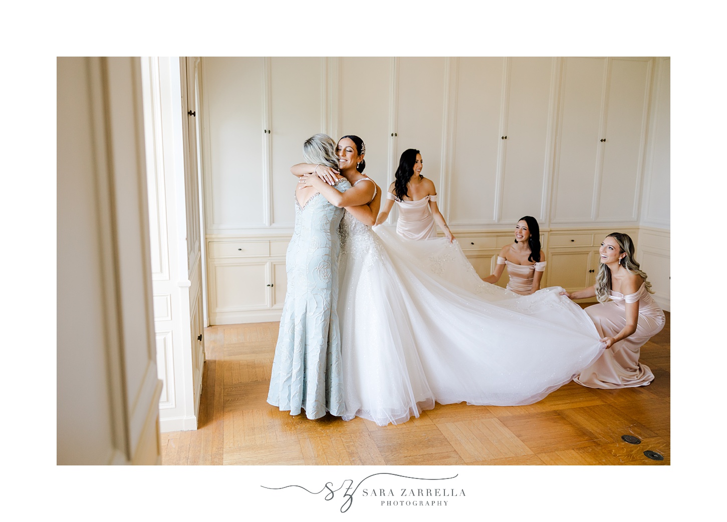 bride hugs mother during prep for wedding at Glen Manor House