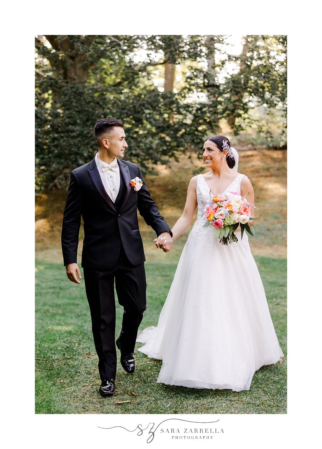bride and groom walking on the lawn at Glen Manor House