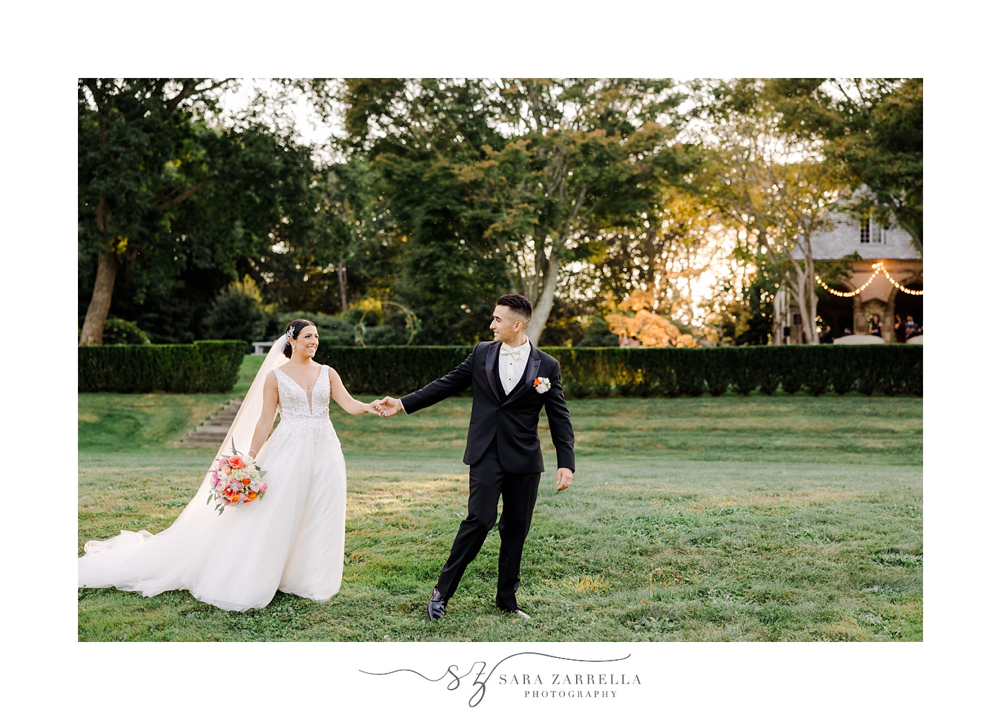 groom leads bride across the lawn at Glen Manor House