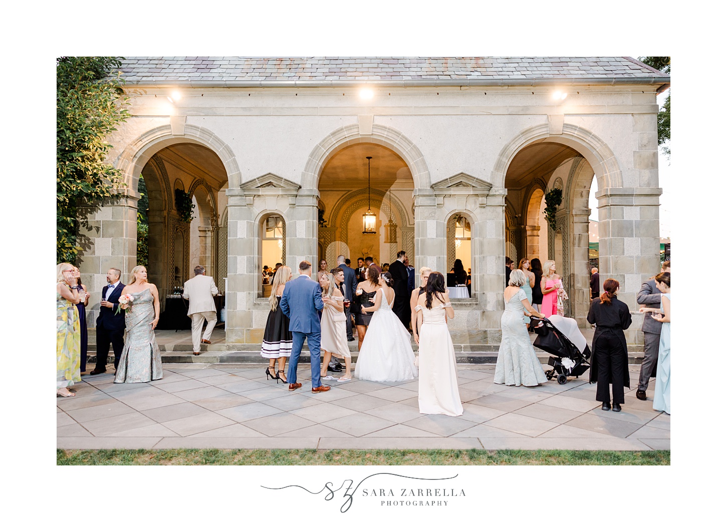 wedding guests mingle on patio outside Glen Manor House