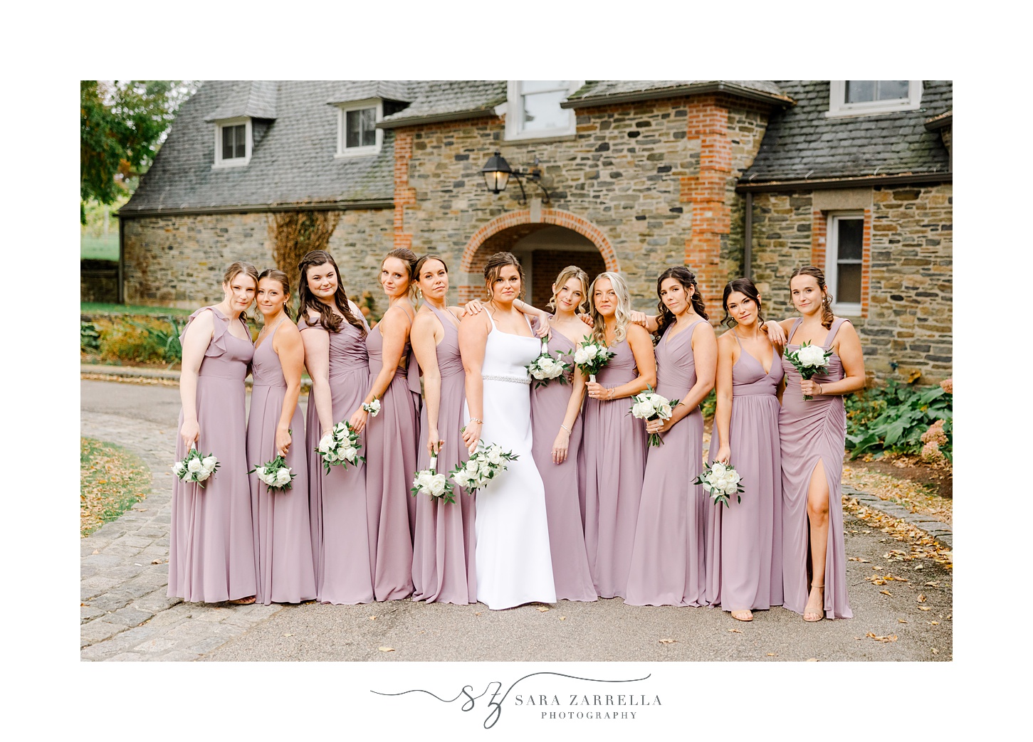 bride and bridesmaids stand together outside Shepard's Run