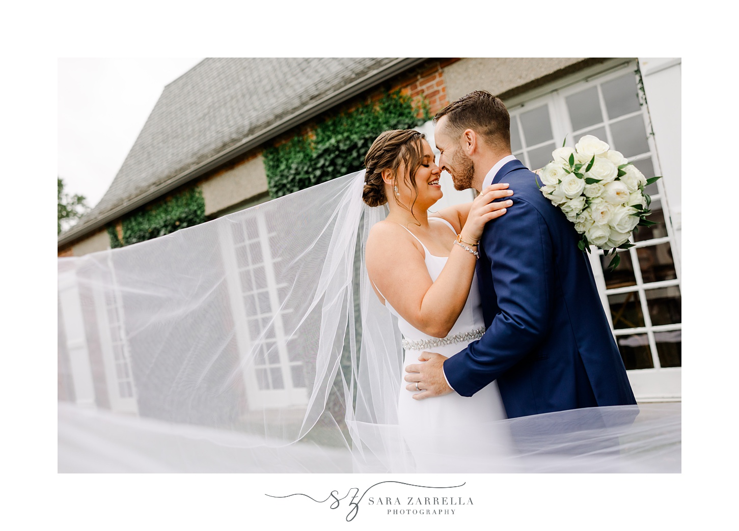 bride and groom hug with veil floating around them at Shepard's Run
