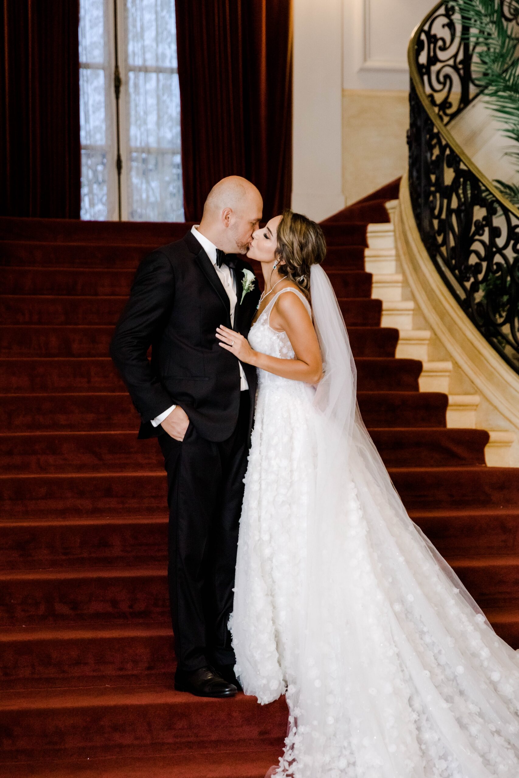 Wedding Photos on Red Staircase Rosecliff Mansion