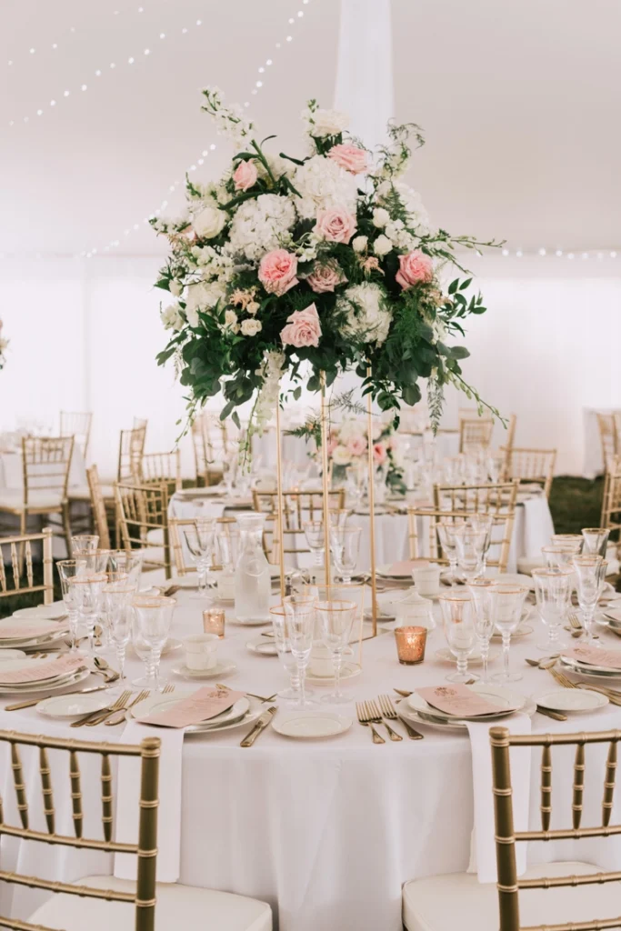 Reception dinner table with rentals used. Rentals for weddings. Wedding planning podcast